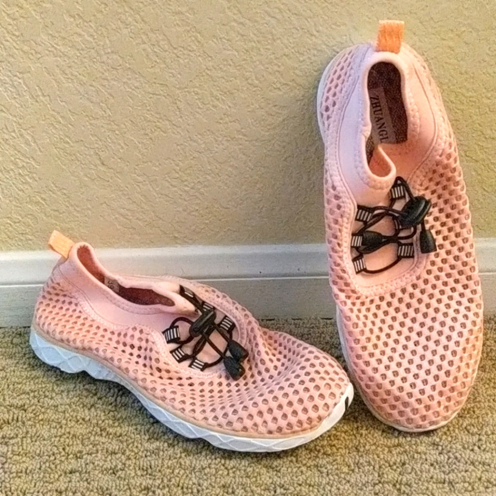 Rose colored water shoes